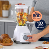 Licuadora Oster® Con Vaso De Vidrio Y Control De Perilla BLSTKAGWRD