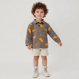 Polera Piqué Manga Larga Niño con Estampado de Dinosaurios Marrón